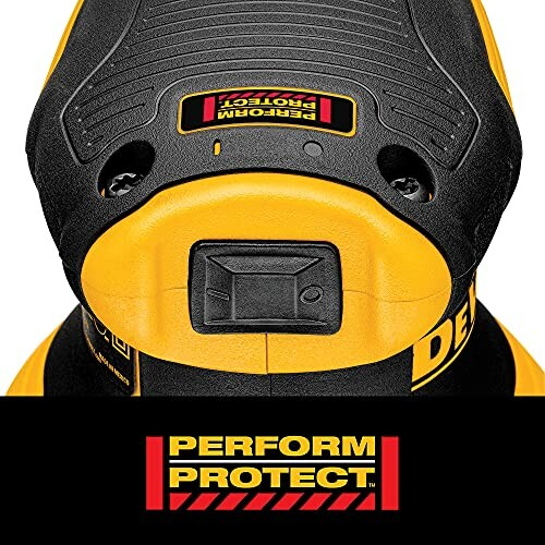 Close-up of DEWALT sander with Perform Protect logo